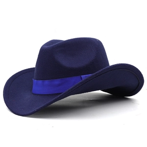 Detail of deep blue cowboy felt hat featuring a decorative bright blue ribbon band