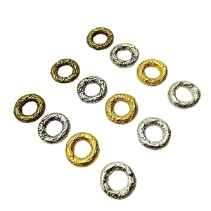 DIY jewelry metal spacer rings with cloud pattern and hammered texture in bronze, gold and silver