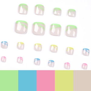 Press on toenails set with vibrant four-color French lines on translucent base