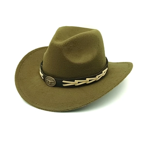 Detailed macro view of western felt hat with bull head buckle on braided leather strap