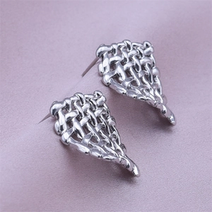 Detail of woven mesh texture on silver 304 stainless steel wing-shaped earrings