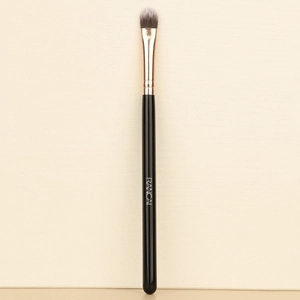 Professional tongue-shaped concealer and lip brush with RANCAI logo and rose gold ferrule