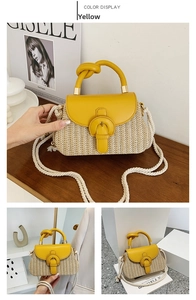 Detail of yellow and white woven straw handbag with leather flap and knot handle