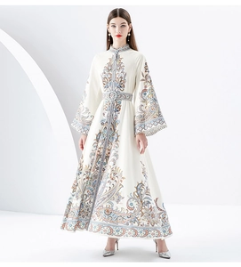 Close-up of the vintage court style stand collar and intricate paisley floral print