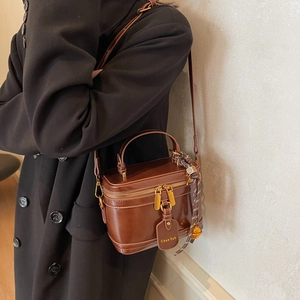 Retro dark brown box bucket bag with top handle and gold hardware for women