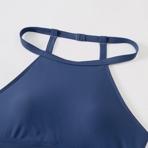 Detail of navy blue sports bikini top with double halter straps and back metal buckle