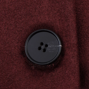 Deep red knit jacket featuring high-quality matte black four-hole button detail