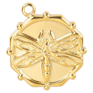 Macro view of gold dragonfly pendant with beaded edge detail on stainless steel necklace
