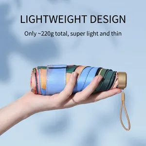 Lightweight 220g mini folding sun umbrella with colorful striped design for portable travel
