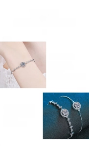 Detail view of S925 silver moissanite bracelet featuring round main stone and star charms