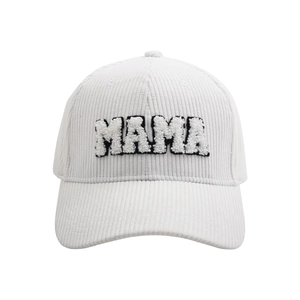 Macro detail of white corduroy fabric and 3D MAMA towel embroidery on baseball cap