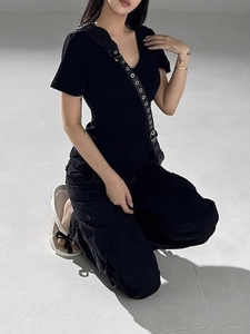 Slim fit black V-neck short sleeve T-shirt with cargo pants on a kneeling model