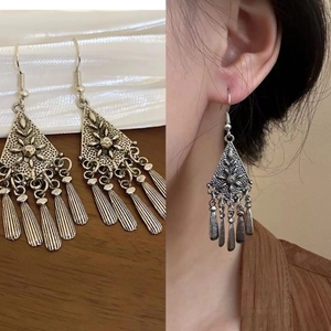 Bohemian vintage silver tassel earrings with hollow carved triangles and drop fringe