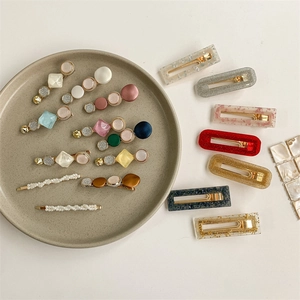 Elegant pearl and acrylic hair clip set in various colors and geometric designs