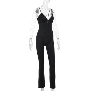 Detail of black lace trim and adjustable straps on a slim fit slimming bodysuit jumpsuit