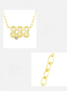 Detail of 925 sterling silver 333 necklace with 5A zircons and golden finish