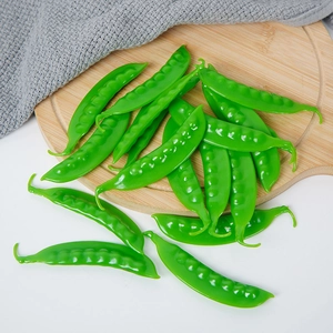 Lifelike artificial PVC snow pea models on wooden tray for kitchen or studio decor