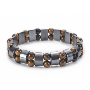 Close-up of double-layer bracelet with tiger eye stones and matte magnetic hematite beads