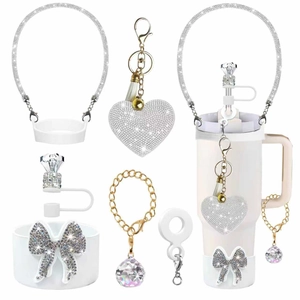 Sparkling water bottle accessory kit with white rhinestone handle and heart keychain