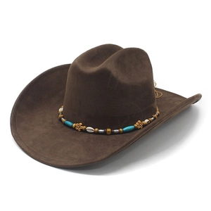 Ethnic vintage dark brown suede cowboy hat with beaded band and floral charm in top view