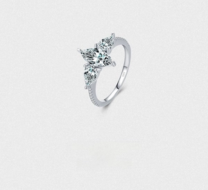 Detail of S925 sterling silver ring featuring marquise-cut gems and side pavé setting