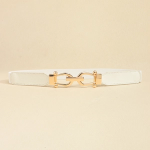 Detail of white elastic waist belt featuring golden U-shaped buckle and leather trim