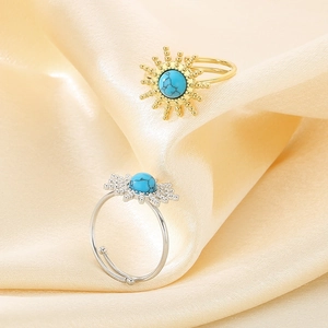 Vintage sunburst stainless steel rings with turquoise inlay on gold and silver finish