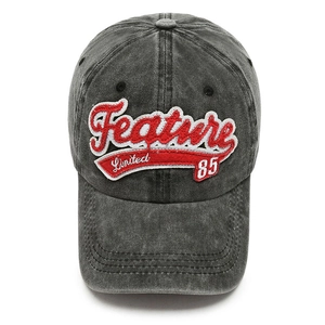 Vintage dark grey washed denim baseball cap with red Feature embroidery on white background