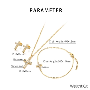 Detailed view of golden stainless steel cross jewelry set with necklace and earrings