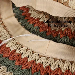 Detail view of the adjustable inner string for head circumference in a woven straw hat
