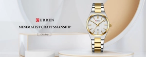 Detail of white textured dial with gold markers on business quartz watch with steel band