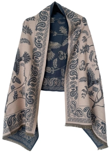 Detailed view of beige and navy paisley jacquard scarf with decorative fringe edges