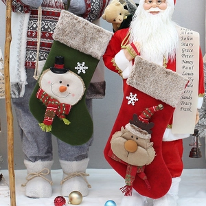 Detailed plush Christmas stockings with 3D snowman and reindeer embroidery and faux fur trim