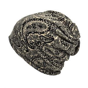 Slouchy paisley print knit beanie in black and white with premium fabric texture