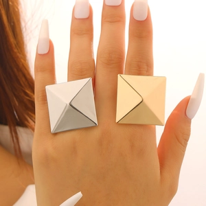 Chic oversized square pyramid rings in gold and silver finish for a bold fashion look