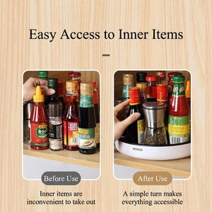 White rotating kitchen condiment tray showing organized spice bottles for easy access