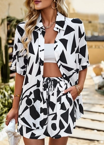 Detail of black and white geometric print shirt and shorts set for summer vacation