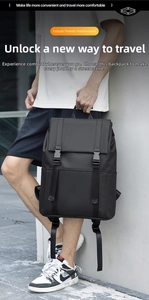 Detail of black business casual backpack with buckle flap and matte waterproof finish