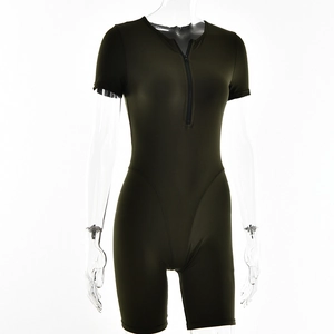 Detail of slim-fit dark green bodysuit with front zipper and short sleeves design