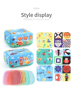 Detail view of baby sensory tissue box toy set with colorful mesh and cloth books