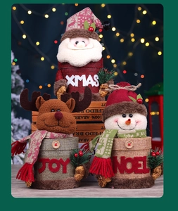 Three festive Christmas character jars featuring Santa, Reindeer, and Snowman designs