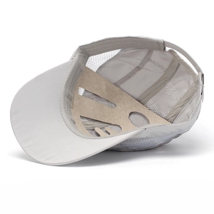 Detail of light grey quick-dry mesh baseball cap interior with breathable lining structure