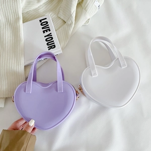 Mini heart-shaped jelly shoulder bag in purple and white glossy finish with metal chain