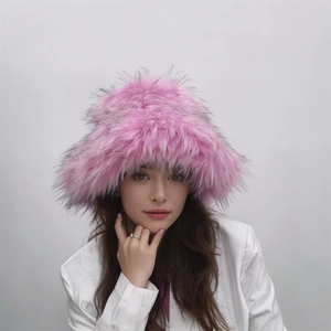 Detail of pink faux fur hat featuring black accents and fluffy punk style texture