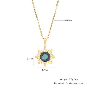 Detailed view of gold stainless steel sun pendant with dimensions and blue inlay