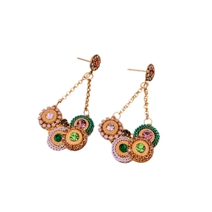 Vintage gold hoop earrings with bohemian woven texture and colorful rhinestones