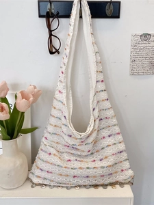 Bohemian white crochet tote bag with colorful stripes and shell fringe detail
