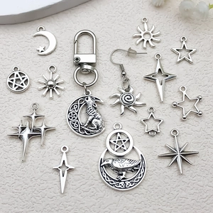 Antique silver charms set featuring moon sun and star pendants for DIY jewelry making