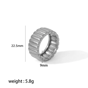 Macro detail of silver gear ring showing 22.5mm diameter and 9mm width dimensions