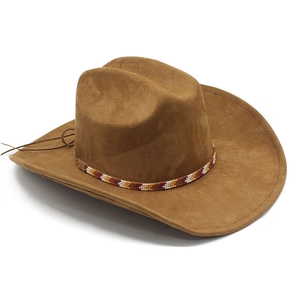 Close-up of brown suede cowboy hat with ethnic beaded band and leather chin strap